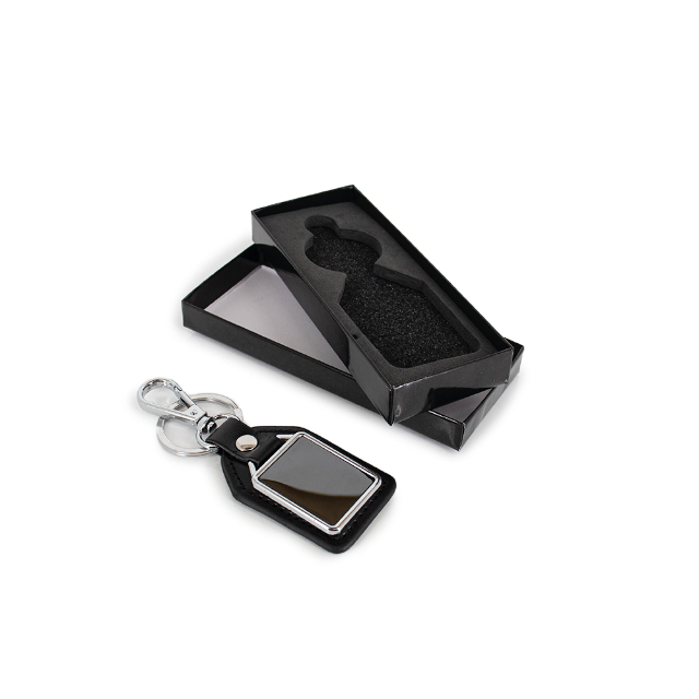  Chaveiro em couro sint�tico e placa de metal (Preto)